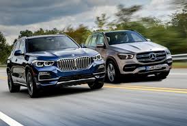 It was introduced to the press at the new york auto show in april 2009 and started appearing in bmw dealerships in september 2009. Mercedes Gle 2019 Vs Bmw X5 2018 Vergleich Ausstattung Preis
