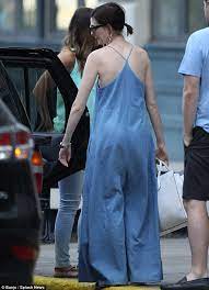 Anne Hathaway conceals her lean physique in a baggy denim jumpsuit as she  steps out with pals in NYC | Daily Mail Online