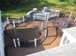 Decks are popular backyard features, but they also make for dramatic front entries. Curved Deck Designs Bring Unbroken Rhythm To Backyard Decks