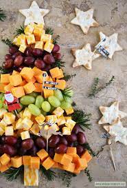 A silicone baking mat is also good if you don't have parchment. Easy Holiday Appetizer Christmas Tree Cheese Board Home Is Where The Boat Is