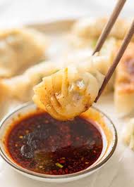 Place a heaped teaspoon of mince mixture in the centre of each wonton wrapper and brush edges with a little water. Potstickers Chinese Pan Fried Dumplings Recipetin Eats