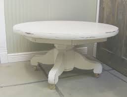 Second, they make your space feel larger than rectangular or square coffee tables because they curve away from. Vintage Distressed White Pedestal Coffee Table By Royaloakcottage Painted Coffee Tables Unique Furniture Painting Coffee Table White