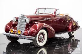 Image result for Mansion Maroon 1938 Oldsmobile