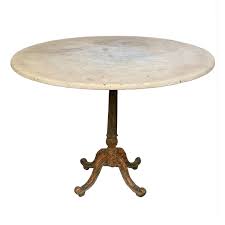 Tables from the early and middle 20th century also have value, especially to those who love to decorate with the simpler lines of this era. Antique French Cast Iron Table Marble Top Inner Gardens