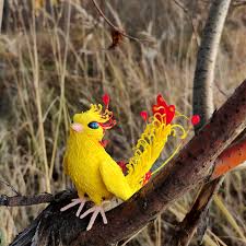 Paradise bird. Yellow fantasy birds. Fantasy figure