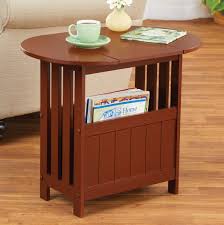 Drop one leaf and push it against the wall to create a makeshift desk, drop both leaves to create a tv stand or console table, or lift both leaves and sit four people comfortably for dinner. Drop Leaf Design Side Table With Magazines Holder Collections Etc