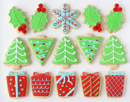 This cookie cutter is just the contour, it comes with these videos will walk you step by step on how to create the cookies pictured with a bird's eye view of me decorating them. Decorated Christmas Cookies Glorious Treats