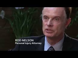 Attorney Rod Nelson and client Nancy