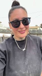 Melissa Masterson Gribbins Putging Down Black Mulch