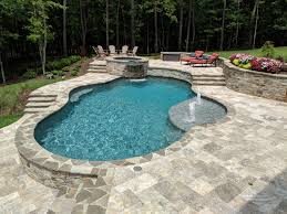 Inground Swimming Pool With Irregular Flagstone Coping And Silver Travertine Decking Blu Swimming Pools Inground Pools Backyard Inground Luxury Swimming Pools