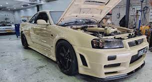 Tan-Colored Nissan Skyline R34 GT-R With 1,150 HP Would Look Right At Home  In A Desert | Carscoops