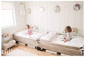 Probably the most traditional layout, this formation has a nice visual symmetry and. Try These 25 Ways To Carve Out A Bedroom In Your Studio Apartment Shared Girls Bedroom Kids Rooms Shared Girls Bedroom Makeover