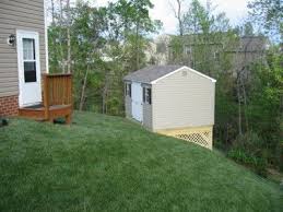How To Put A Shed On A Slope The Homestead Survival Garden Shed Diy Sloped Backyard Building A Shed