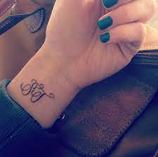 When it comes to making your return address clear, monogram address stamps are an affordable and easy way to get the job done. Best Initial Tattoo Designs Get Permanent Initial Tattoos Of Loved One Name Initial Wrist Tattoos Tattoos For Kids Kids Initial Tattoos