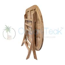 Like a coat closet, a wooden garden shed can hold (and hide from view) all sorts of stuff you own: Oval Folding Table Ocean Teak