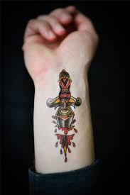 This is a book i've been saying for years that i wanted to read but just never took the plunge. Old School Style Colored Wrist Tattoo Of Bloody Fantasy Dagger Tattooimages Biz