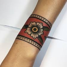 Tattoo By Julianaodett Traditional Traditionaltattoo Traditionalartist Oldtattoo Oldschooltat Tattoos Cuff Tattoo Traditional Tattoo Flowers