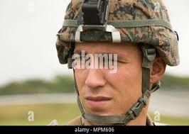 Sgt. Maxwell M. Dossett observes his surroundings during a non-combatant  evacuation evaluation