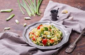 Maybe you would like to learn more about one of these? Tabbouleh An Arabian Vegetarian Salad Made Of Couscous Tomato Cucumber Onion Garlic Parsley And Lemon Juice Selective Focus Stock Photo Picture And Royalty Free Image Image 48697030