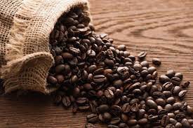 Fresh Roasted Coffee Beans Scattered From Sack On Wooden Table Fresh Roasted Coffee Beans Fresh Roasted Coffee Roasted Coffee Beans