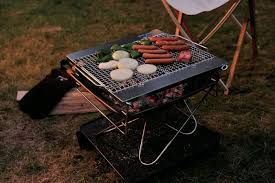 Designed and built in niigata, japan, the pack &amp; Takibi Fire Pit And Grill By Snow Peak Superfolk
