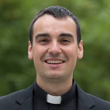 Philip Cooley, a Xavier University alumnus, who was involved in the  university's Center for Faith and Justice, is one of seven Midwest Jesuits  who professed first vows in the Society this month.