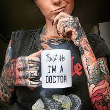 Personally, i think tattoos that are not vulgar should be appropriate to be visible if wore with normal scrubs. Meet The Heavily Tattooed Doctor Taking Over The Medical Field Tattoo Ideas Artists And Models