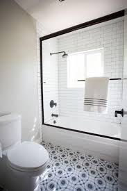 Black And White Patterned Floor Tiles Bathroom Black And White Bathroom With Patterned Floor Tile And Subway Tile Glass Door Shower Tub Shower Doors Tub With Glass Door Black Shower Doors