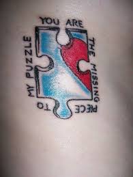 Heart with puzzle pieces missing tattoo angel babies. Fyeahtattoos Com Puzzle Piece Tattoo Puzzle Pieces Couples Tattoo Designs