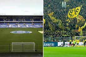 Over 22,000 black and yellow supporters watching a bundesliga match. Everton Reveal Amazing New Stadium Plan Inspired By Borussia Dortmund S Famous Yellow Wall