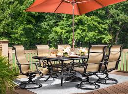 Dine Outdoors In Style With The Moreaux 7 Piece Outdoor Dining Set Its Cast Aluminum Table Has The Beautiful Look Of Wro Outdoor Dining Set Outdoor Dining Set
