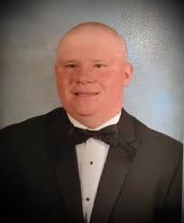 editor please wear him graduating clothes