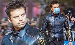 The falcon and winter soldier gives viewers more time to see bucky attempt his rehabilitation tour. Sebastian Stan Rocks Blue Leather Jacket And Matching Face Mask On Set Of Falcon And Winter Soldier Daily Mail Online