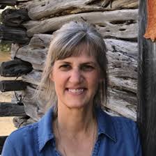 Symbols of Love Repaid in St. Thérèse's Coat of Arms — Little Flower  Basilica