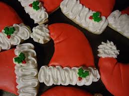 Santa Hat Cookies Santa Hat Sugar Cookies Decorated With Mmf And Royal Icing I Made 24 Of These To Give As F Christmas Cake Pops Hat Cookies Cookie Decorating