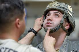 U.S. Army Staff Sgt. James Martell, left, a jumpmaster