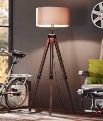 The crossover design tripod floor lamp. Wooden Tripod Floor Lamp With Large Shade In Two Finishes