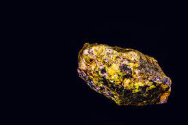 .up with uranium ore, a naturally occurring rock rich in uranium that gives off potentially dangerous radiation. Uranium Ore Stock Photos And Royalty Free Images Vectors And Illustrations Adobe Stock