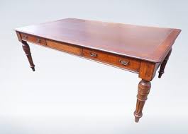 We've since expanded our collection to meet a variety of evolving aesthetics and functions, including technological needs. 2 Metre Antique Partners Library Desk Victorian Oak Leather Top