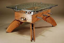 The smaller table can be partially (or fully) tucked under the larger piece, or they can be displayed separately to provide more functional space in your living room. Dining And Coffee Tables With Built In Games Practical Furniture For Funny Evening Creative Coffee Table Unique Coffee Table Modern Wooden Dining Room Tables
