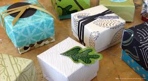 Embellish the boxes with tags (also from crate paper), and fill with tissue paper or easter grass. Learn To Make Tiny Gift Boxes Out Of Last Year S Greeting Cards Think Make Share