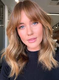 1.2 medium length hairstyle ponytail updo 1.6 gorgeous medium hairstyles These Hair Trends Are Going To Be Huge In 2021 Southern Living