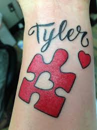 Puzzle piece shoes on thigh. Piece Of My Heart Autism Tattoos Puzzle Piece Tattoo Autism Tattoo Autism