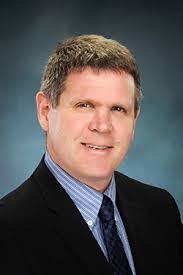 Bruce D. Grant, K.C.