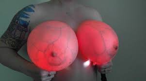 What huge implants look like with light shining through them :  r/oddlyterrifying