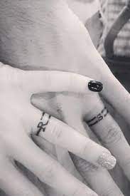 26 Sweet Wedding Ring Tattoo Ideas Ring Tattoo Designs Tattoo Wedding Rings Couples Ring Tattoos