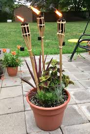 Tiki Torch Planter Backyard Landscaping Designs Tiki Torches Backyard Landscape Design Backyard Diy