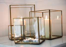 What are the specifications of glass candle holders? Large Antique Brass And Glass Hurricane Candle Holder Lantern By Nkuku
