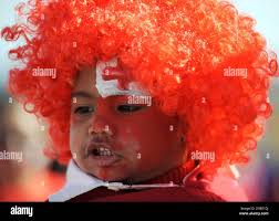 A young Tongan fan with a painted face prior to the start of the Rugby  World Cup match between France and Tonga in Wellington, New Zealand,  Saturday Oct. 1, 2011. (AP Photo/Ross