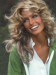 Farrah, name changed to Tesla, was the first to tap out of the action. She  settled into Nick's lap as a spectator. She is so pretty, just like Farrah  Faucet. Of course